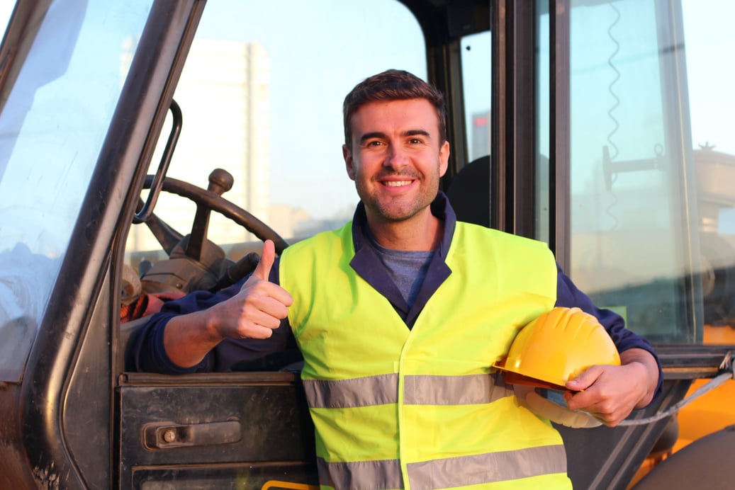 Happy construction worker close up